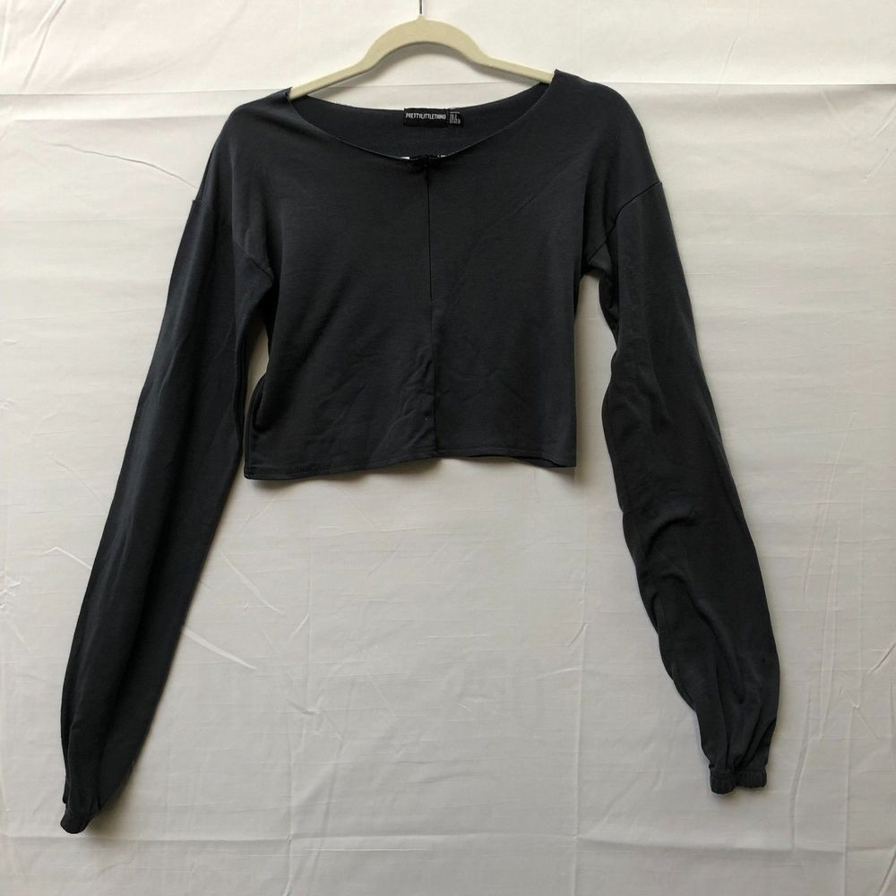 Pretty Little Things Black Cropped Long Sleeve Top